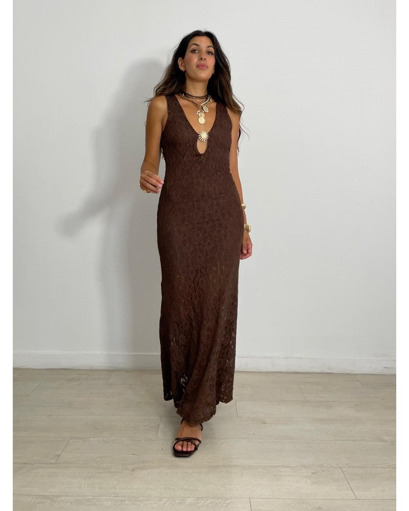 Lace dress with sun brooch