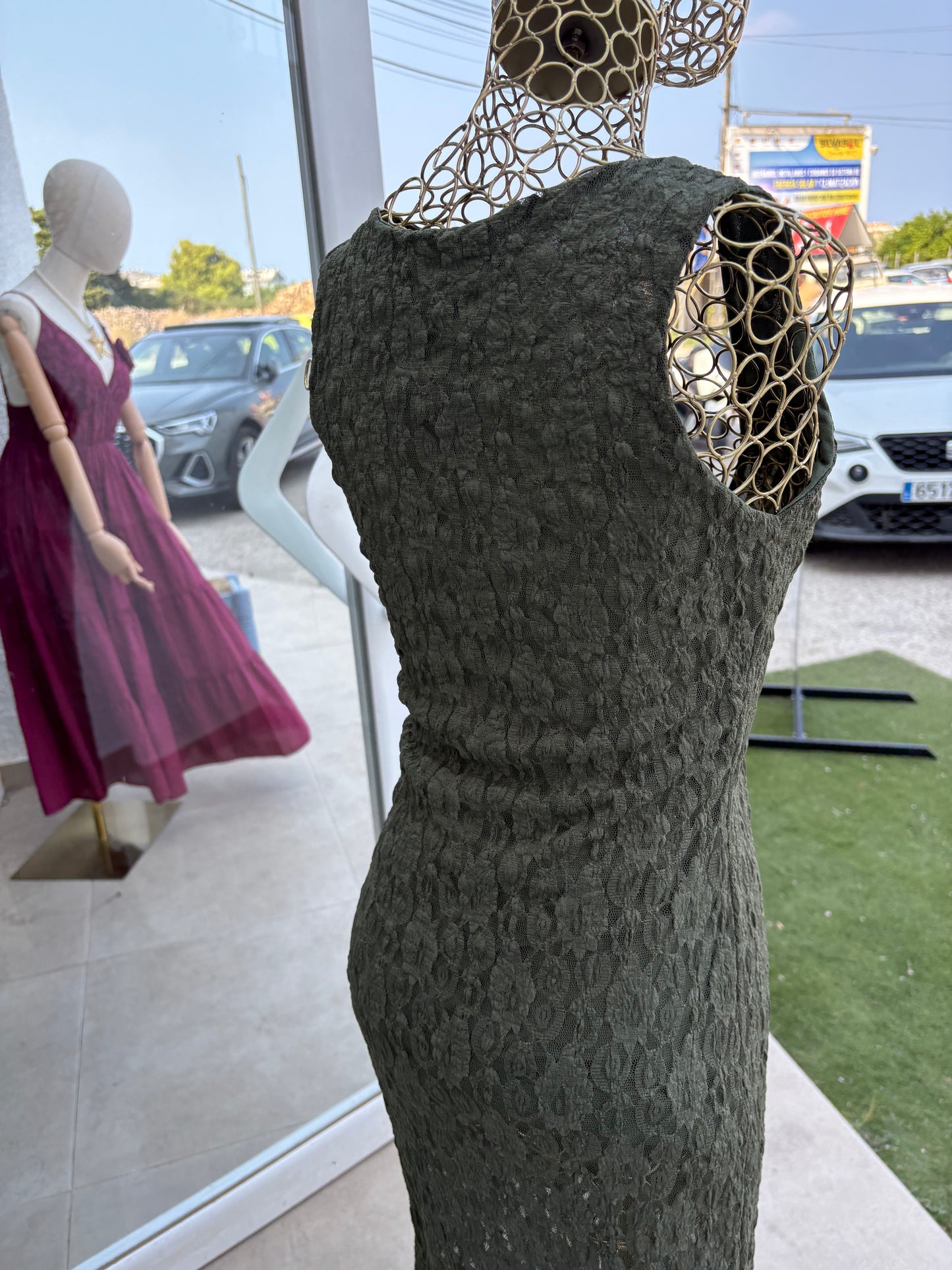 Lace dress with sun brooch