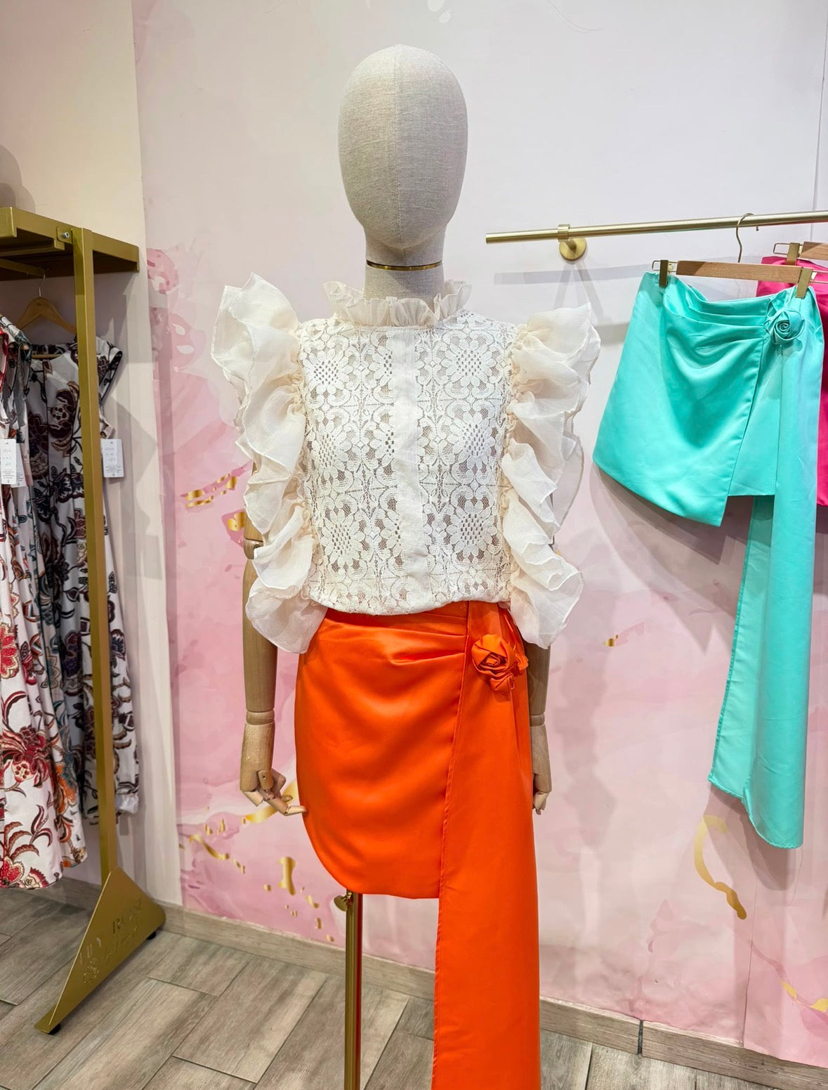 Orange Mini Skirt with Rosette Detail