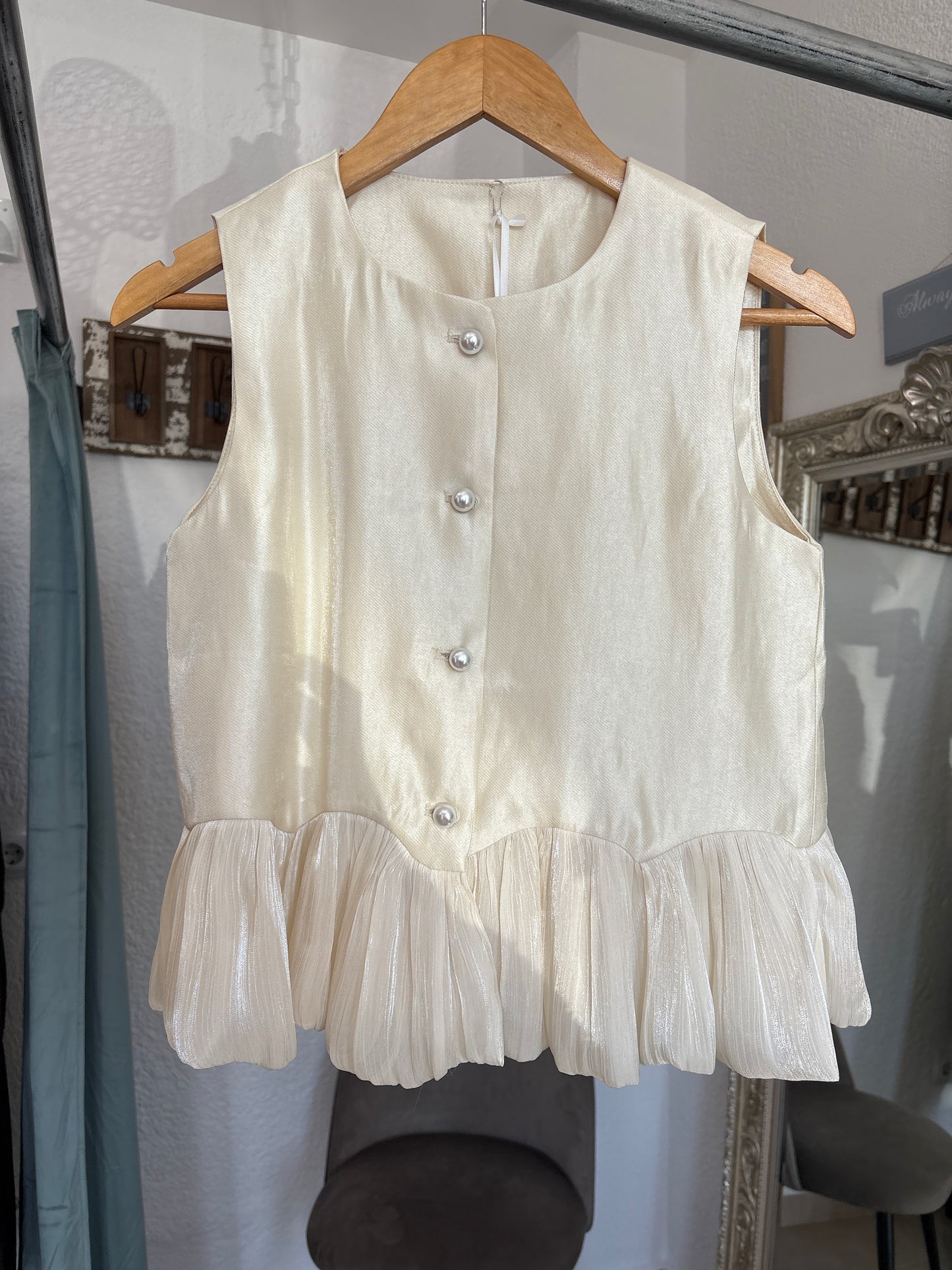 Peplum and pearl waistcoat