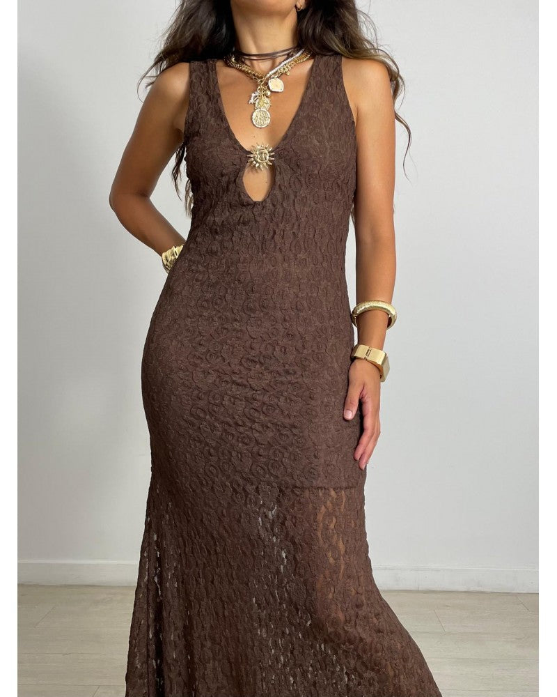 Lace dress with sun brooch