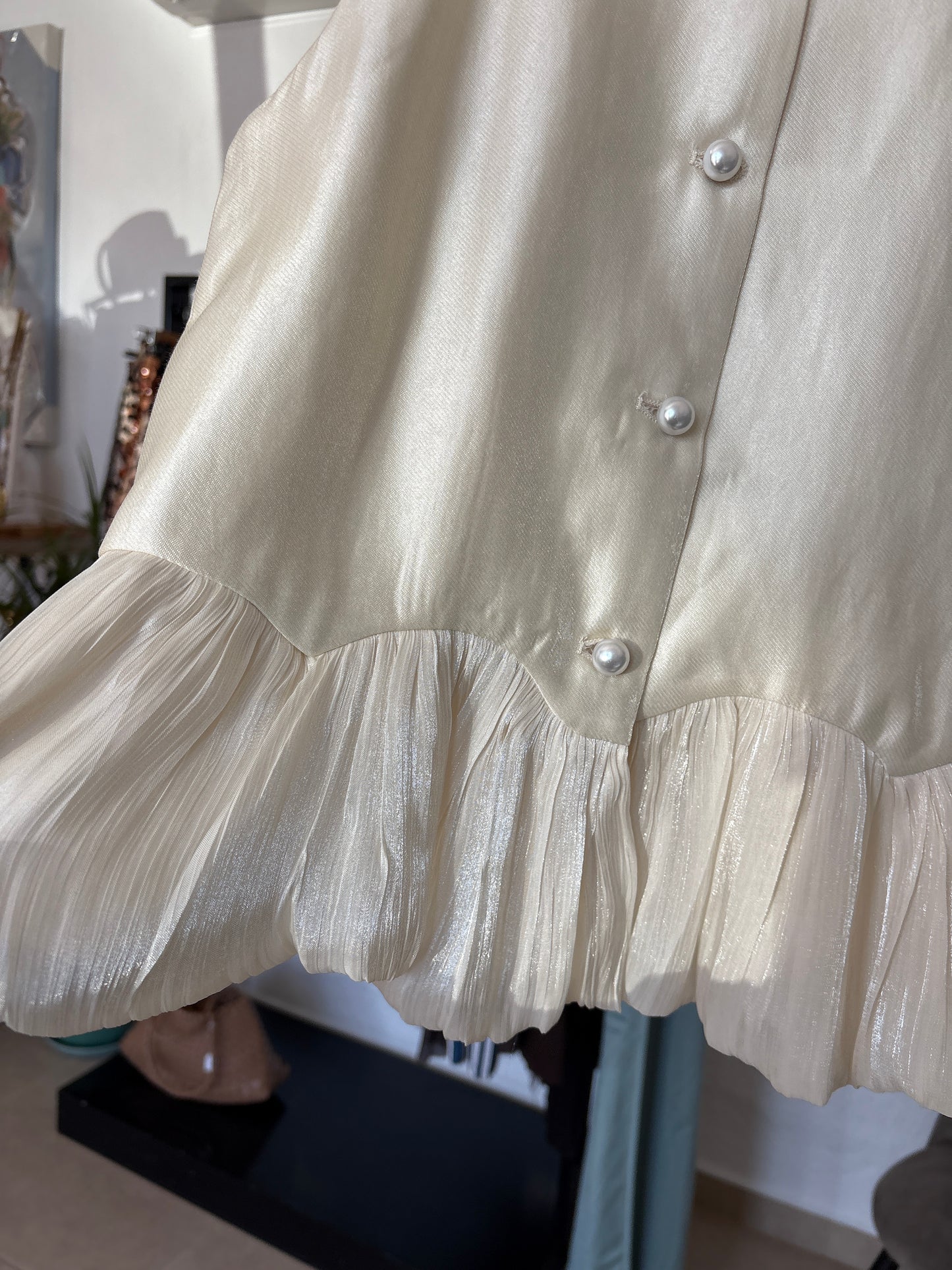 Peplum and pearl waistcoat