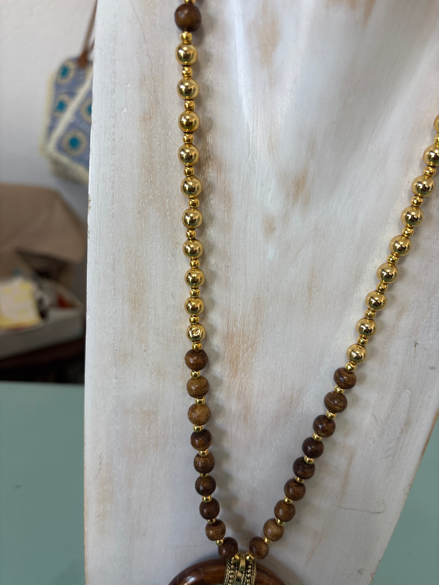 Boho wood and gold pendant necklace