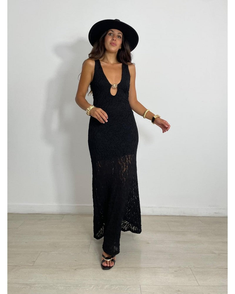 Lace dress with sun brooch
