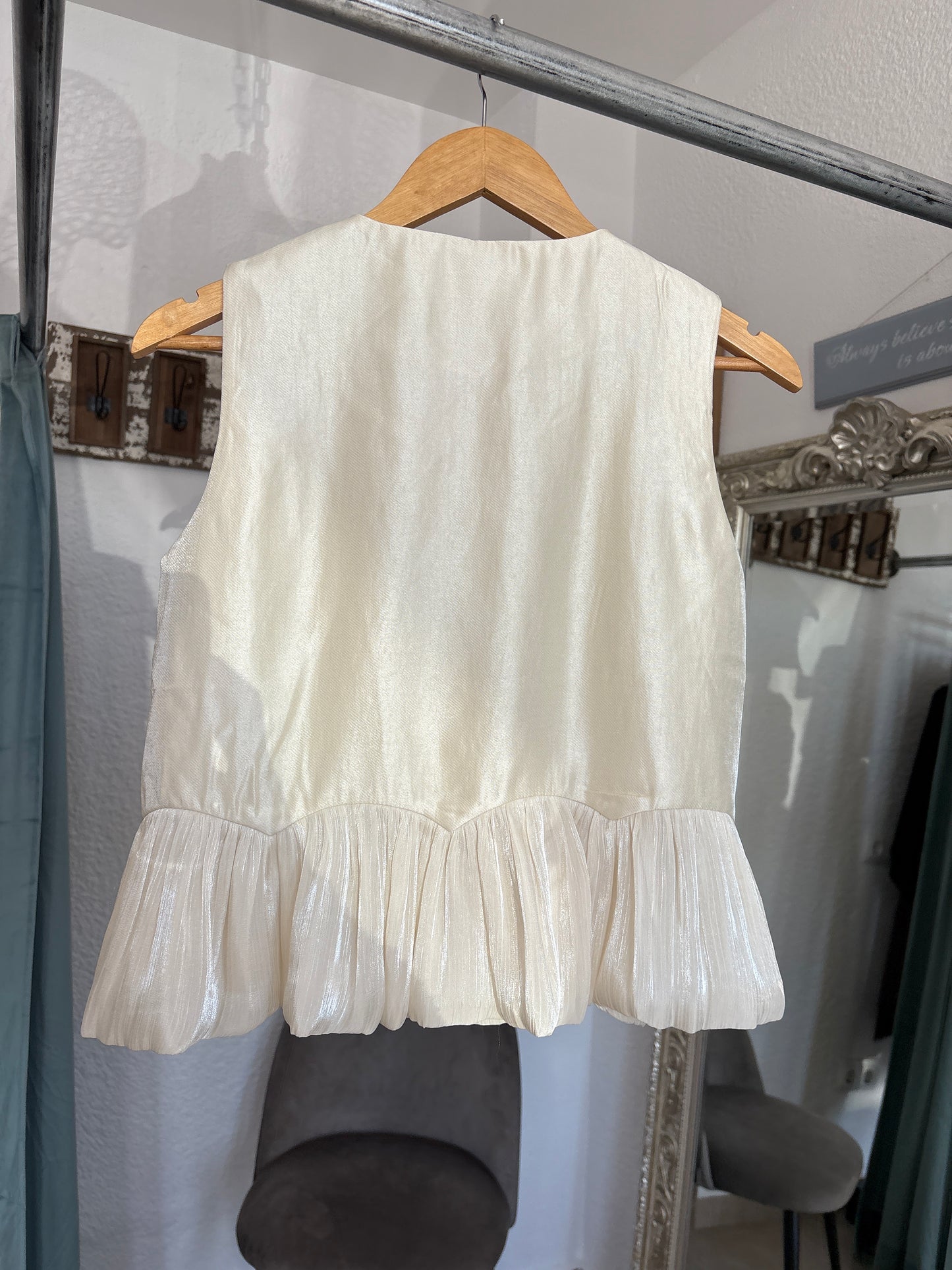 Peplum and pearl waistcoat